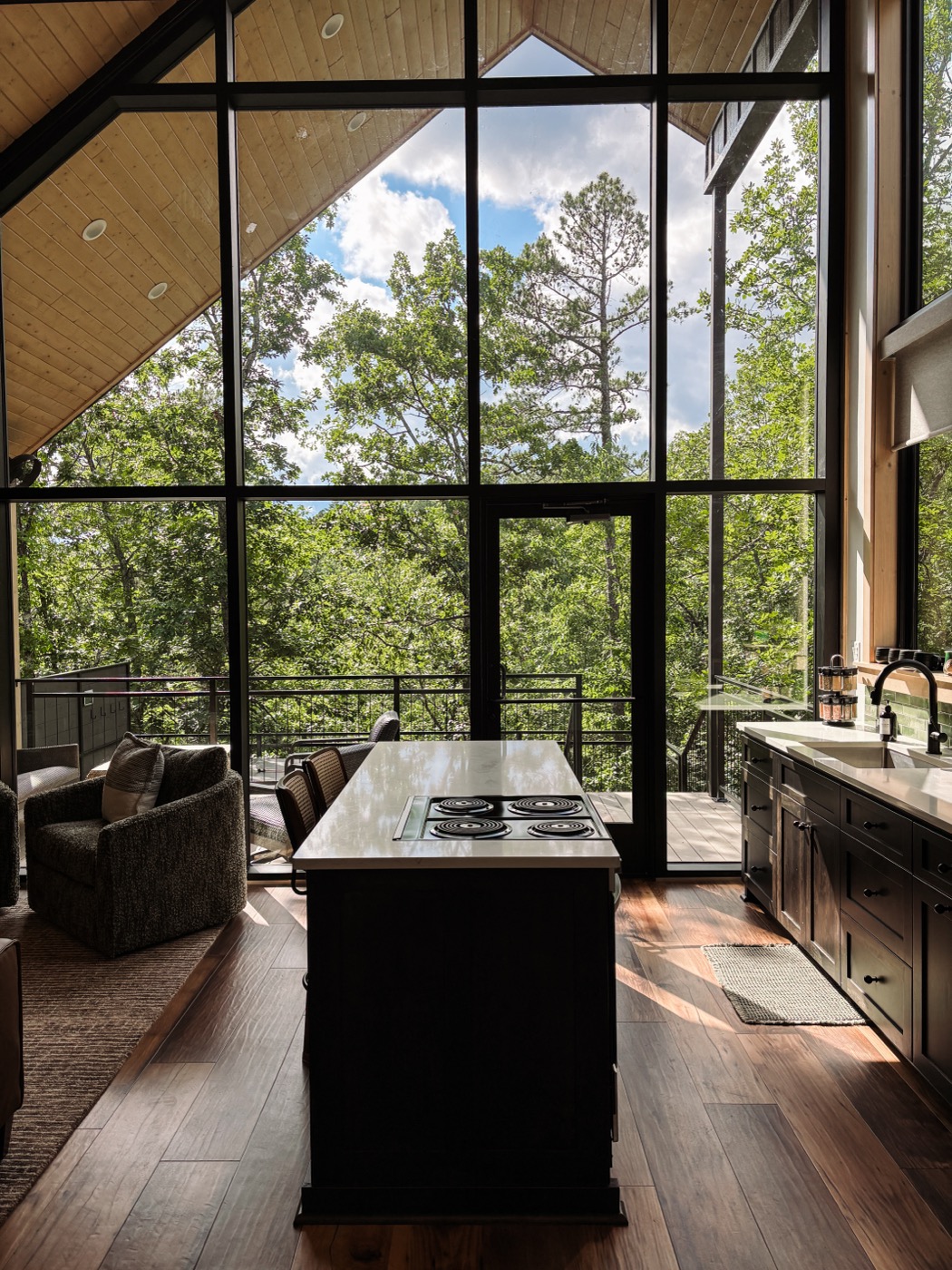 Kitchen island with floor-to-ceiling windows