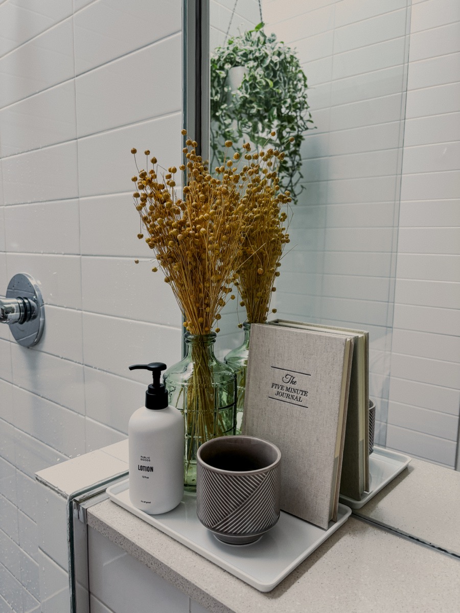 Self-care bathroom shelf flatlay